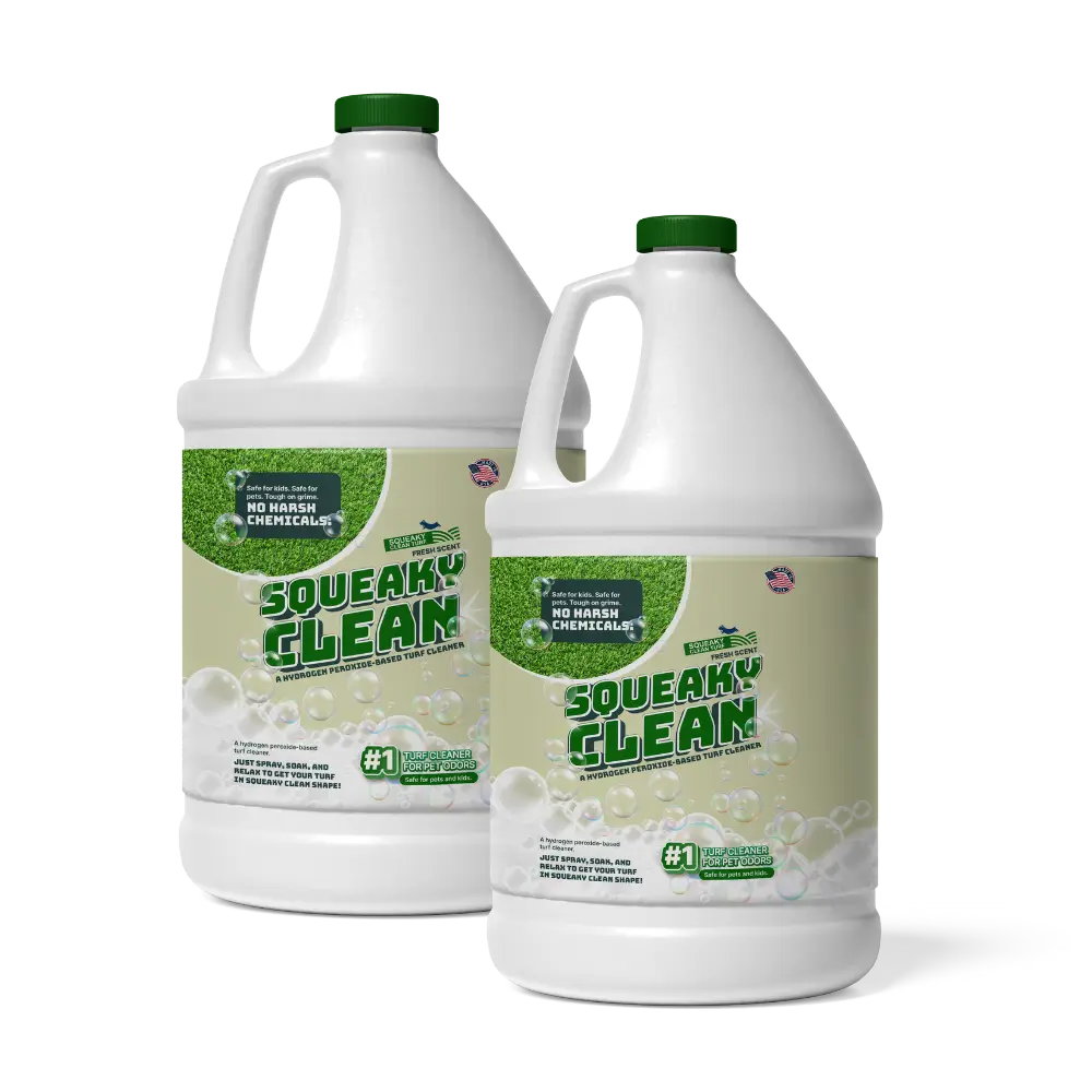 Two large white containers with green labels, marked "Squeaky Clean," featuring cleaning bubbles and words "No Harsh Chemicals." Designed for turf cleaning.