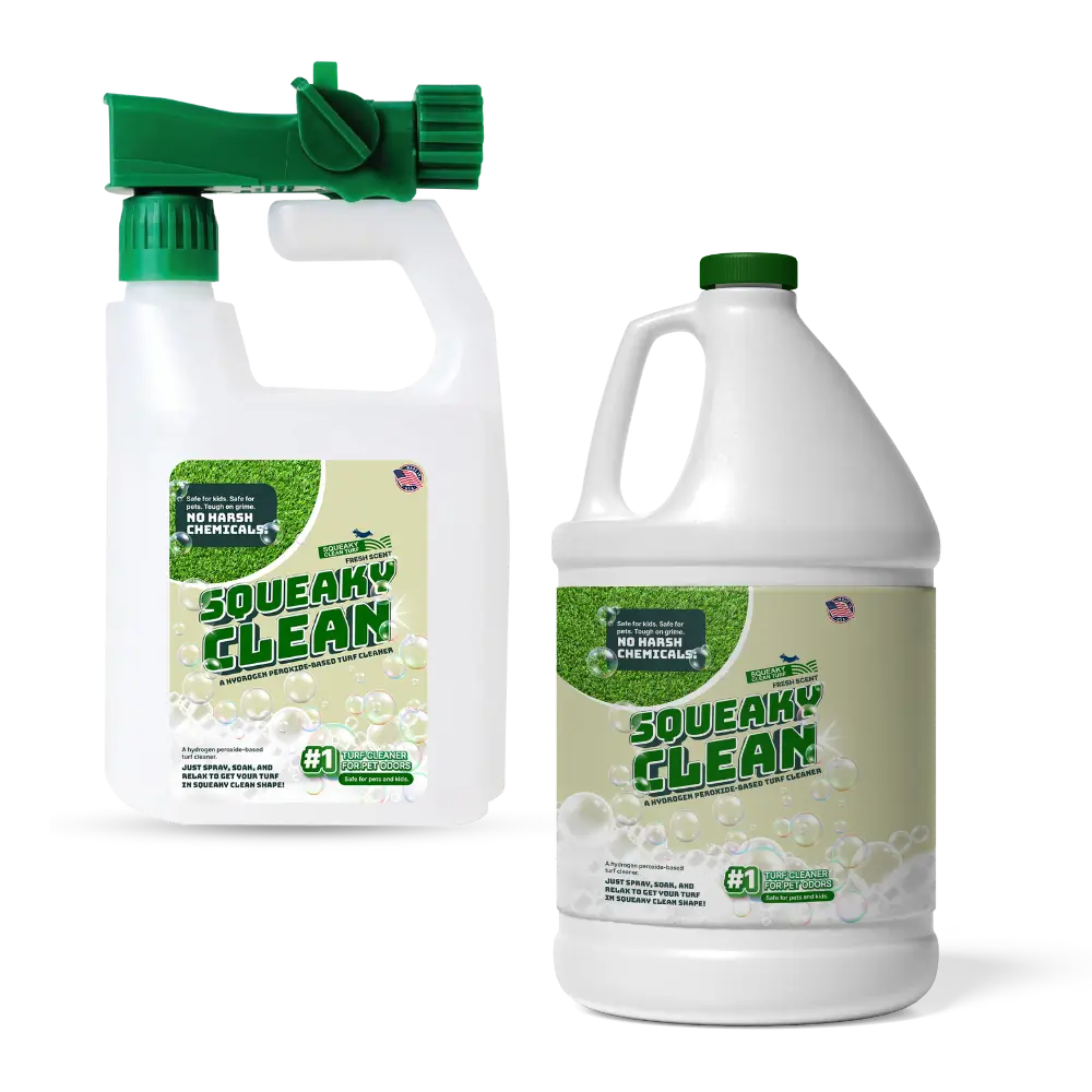 Two bottles of Squeaky Clean turf cleaner, labeled with "No Harsh Chemicals," featuring a hose attachment and a green cap.