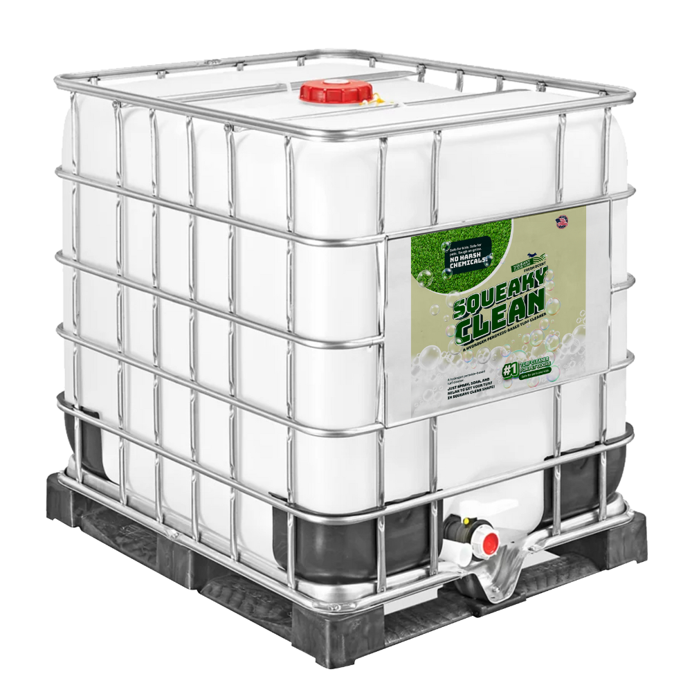 A large, white industrial container labeled "Squeaky Clean" is secured with a metal frame and placed on a black pallet.